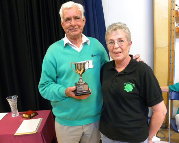 John Hare-Brown receives trophy from Margaret Kiff