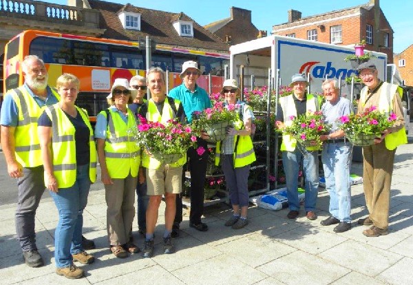 Arrival of hanging baskets for the town