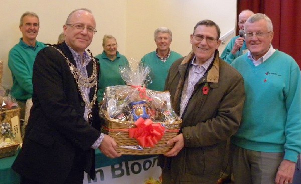 David Morgan from Vision Wimborne, won third prize in the raffle